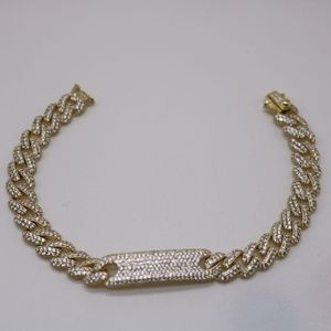 Gold Cuban Bracelet with multiple crystals.